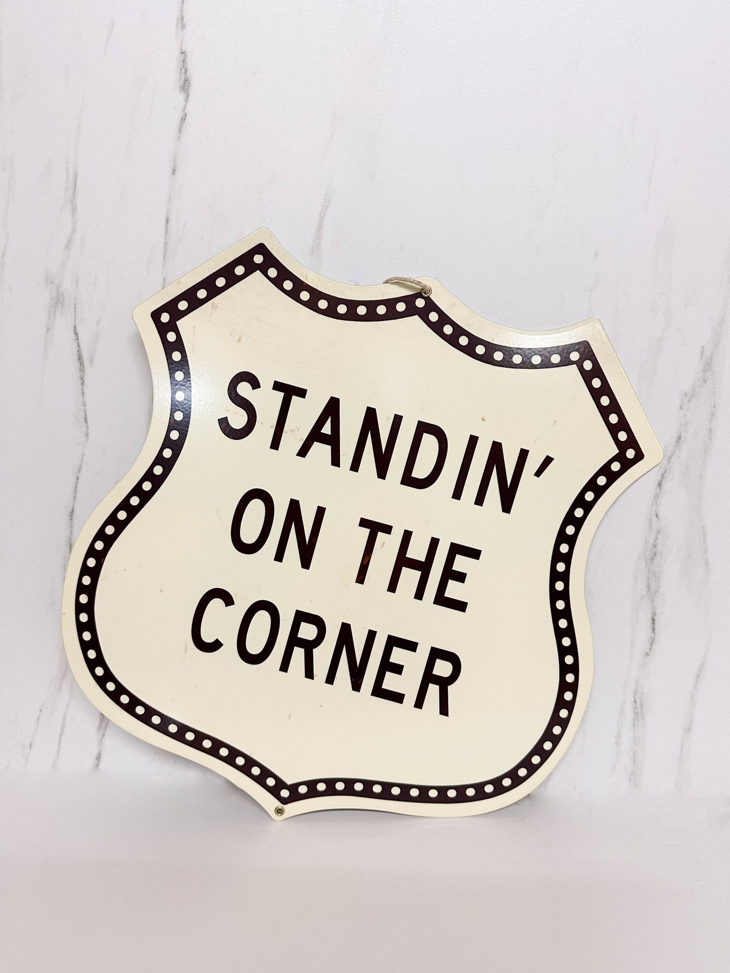 Standin' On the Corner Shield Sign